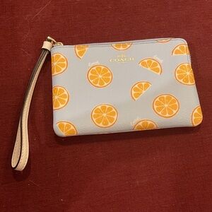Coach Citrus Print Wristlet in Light Blue and Orange